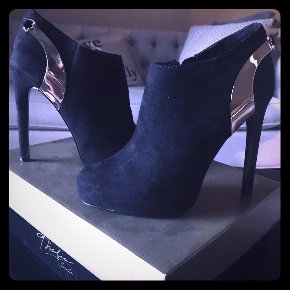 Black and gold high heel shoes